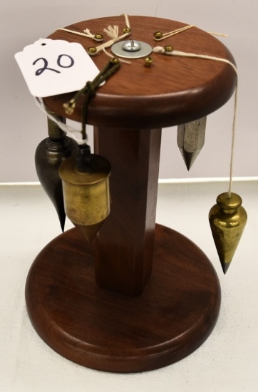 5 Plumb bobs on stand
