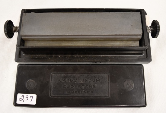 Carborundum duo-stone sharpener in plastic case