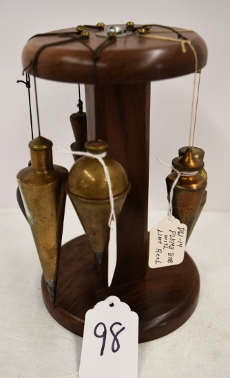 6 Plumb bobs on stand