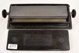 Carborundum duo-stone sharpener in plastic case