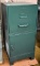 Metal file cabinet with Sinclair Dino Decal