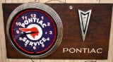 Pontiac service neon clock and sign,