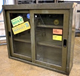 Hanging metal cabinet from service station,