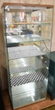 Glass showcase, lighted, 61