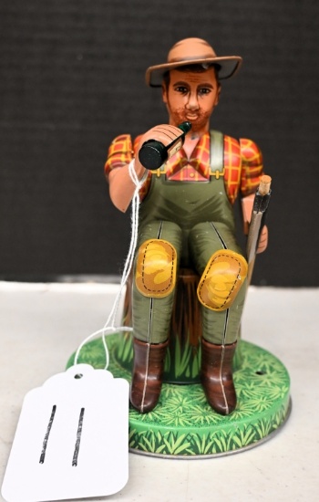 Battery operated lumber jack drinking whiskey