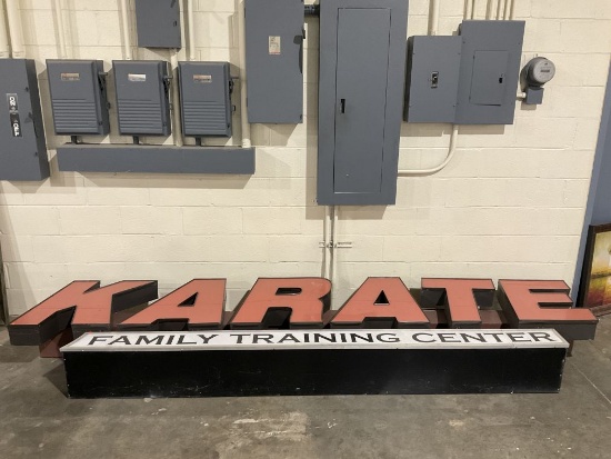Red Karate Lighted Sign with White Family Training Center Lighted Sign