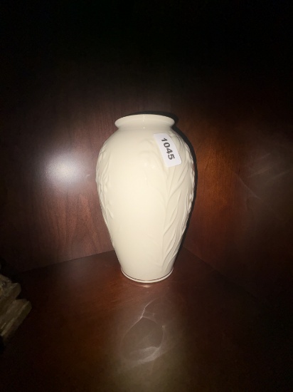 Elegant White Porcelain Vase with Embossed Botanical Relief