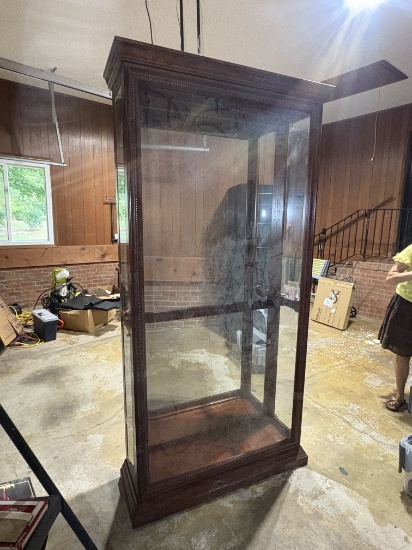 Elegant Mahogany Glass Curio Cabinet with Dentil Crown Molding and Mirror Back