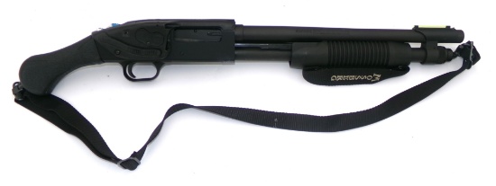 Mossberg 590 20 Gauge Shotgun with Laser, Side Saddle, and More