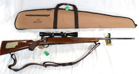 Ruger M77 7mm Rem Mag Bolt-action Rifle w/Redfield 3-9x Scope and Leather Sling