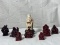 Group of 8 Resin Buddhas