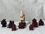Group of 8 Resin Buddhas