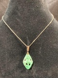 Sterling Silver Necklace with Carved Jade Pendant