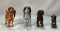 Four Figures of Dogs