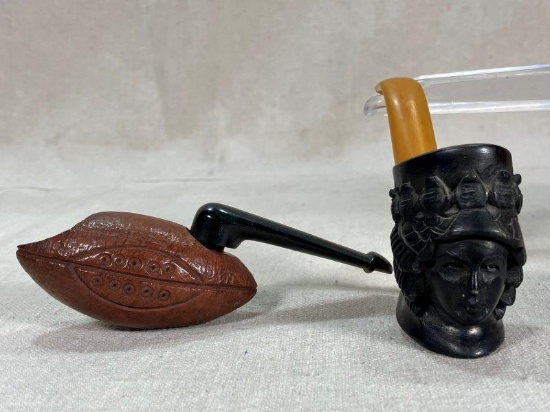 Two Figural Pipes