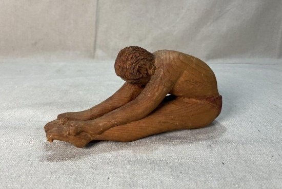 Folk Art Carving of Stretching Man
