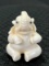 Carved Bone Miniature Seated Elephant