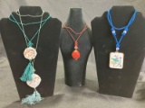 Chinese Necklace Assortment Featuring Hand-Painted Porcelain and Carved Cinnabar