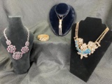 Costume Jewelry Assortment Featuring Necklaces and a Bracelet