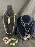 Necklace and Bracelet Assortment Featuring Carved Bone