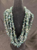 Group of Four Green Kyanite and Gold Tone Bead Necklaces