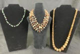 Necklace Trio Featuring Natural Wood Beads and Shell