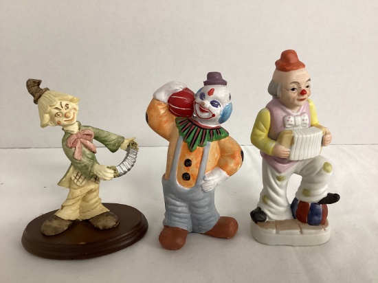 Three Clown Figures