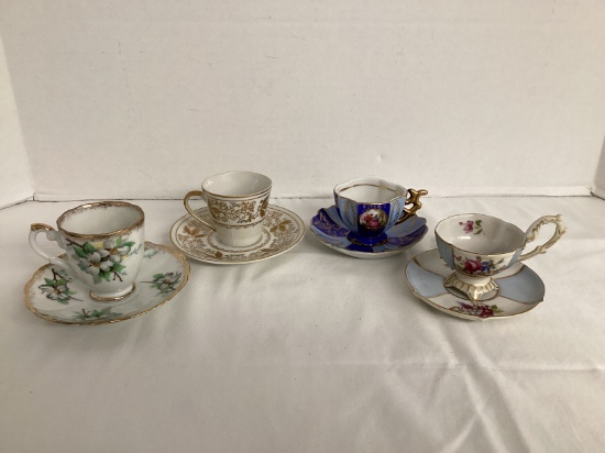 Four Demitasse Cups and Saucers