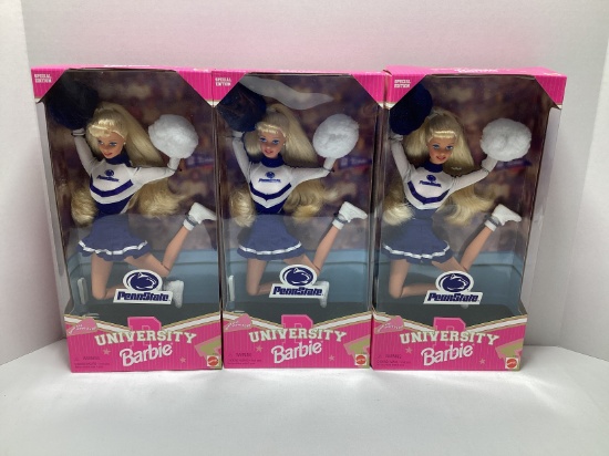 Three Penn State University Barbie Dolls