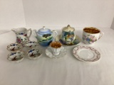 Creamer, Sugar Bowls, Teacups, Saucers, and Condiment Bowls