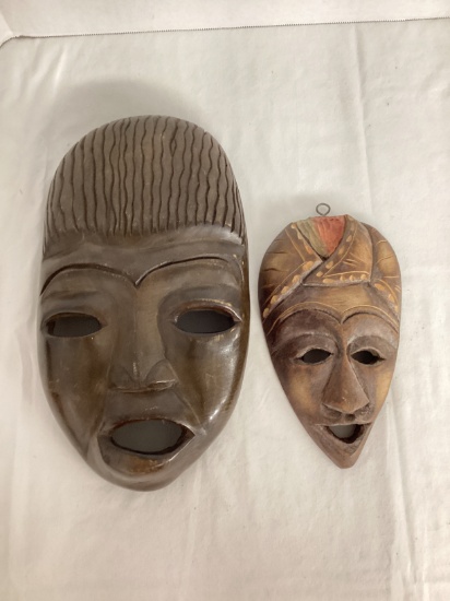 Two Wood Carved Wall Masks