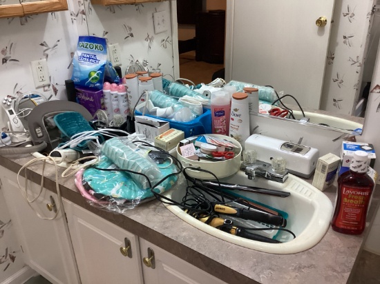 Bathroom Counter Contents: Shampoo, Band-Aids, Hair Straighteners, and More