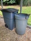 Two Outdoor Rubbermaid Trash Cans