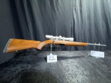 RUGER AMERICAN 22 CAL STAINLESS WALNUT STOCK WITH SCOPE SN#834-54077