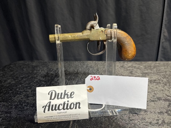 ANTIQUE BRASS DOUBLE BARREL BLACK POWDER PISTOL SN#NA