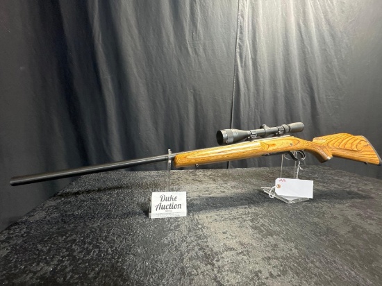 REMINGTON MOD 700 243 CAL HEAVY BARREL WITH LAMINATED STOCK WITH SIMMONS 6X18X40 SCOPE SN#E6516935