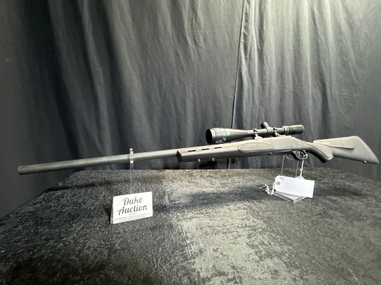 REMINGTON MOD 700 223 CAL HEAVY BARREL WITH TASCO 6X24X50 SCOPE SN#G6887461