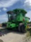 JOHN DEERE 9660 STS 2 WHEEL DRIVE COMBINE 4307 ENGINE HOURS, 2799 SPREADER HOURS, NEW TURBO AND