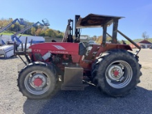 MCCORMICK C70 TRACTOR W/ LOG CABIN POST DRIVER