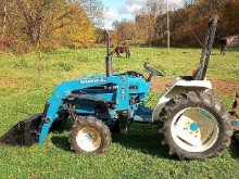 FORD 1715 W/ WOODS 155 LOADER