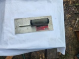 CONCRETE finishing trowel