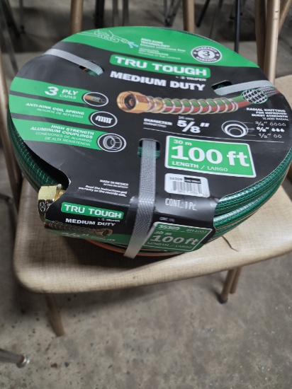 New 5/8 x 100 ft tru tough water hose
