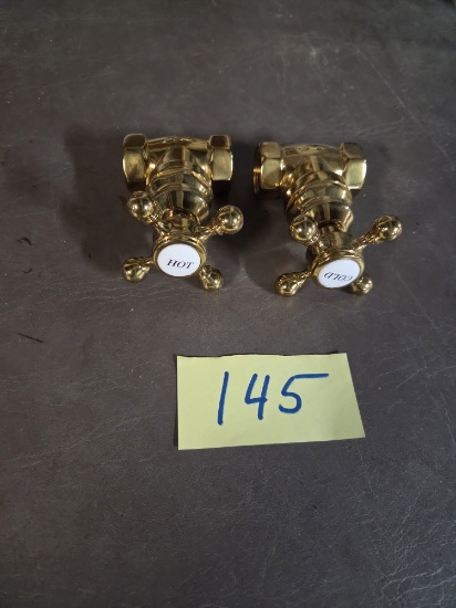 New Newport brass water spigots, hot and cold three quarter inch