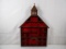 WOODEN CHURCH STYLE WHAT-NOT SHELF WITH BELL IN STEEPLE.