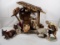 (7) PIECE ENORMOUS NATIVITY SCENE WITH PORCELAIN FIGURESAND WOODEN CRECHE