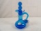 VINTAGE RAINBOW BLUE CRACKLE GLASS BOTTLE WITH STOPPER.