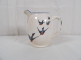 BUFFALO POTTERY PITCHER IN BLUE BIRD PATTERN