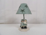 SNOWMAN AND SANTA TEA LIGHT CANDLE HOLDER WITH SNOWFLAKE SHADE.