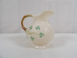 BELLEEK SMALL PITCHER WITH BASKET DETAIL IN SHAMROCK PATTERN