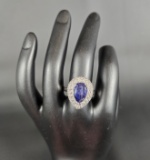 SILVER CZ RING WITH BLUE TEARDROP SHAPED STONE